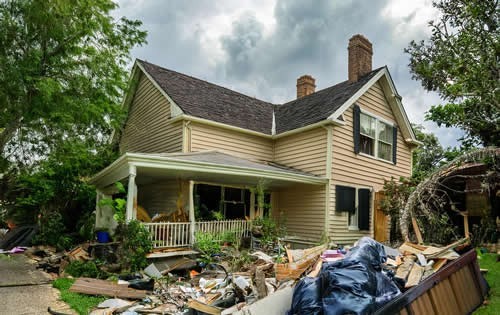 house-with-a-lot-of-garbage-in-yard